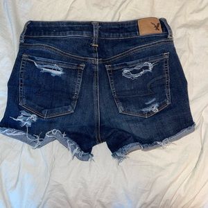 Mid rise dark wash shorts